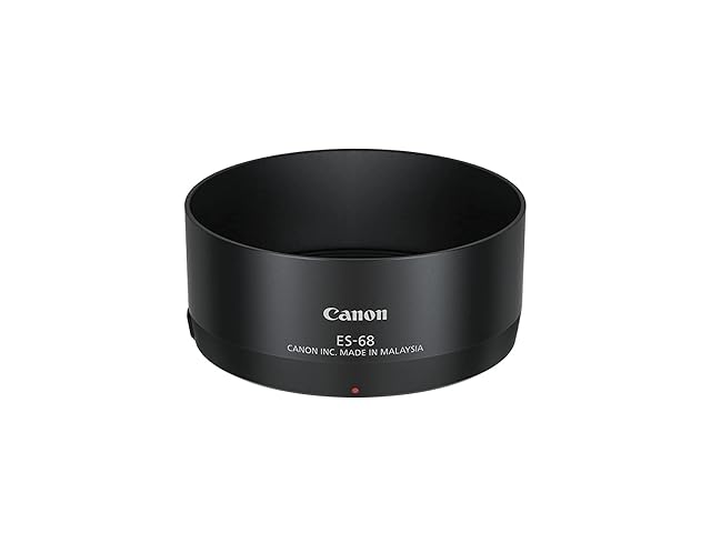 Paraluce Canon ES-68 nero, in piedi su una superficie bianca